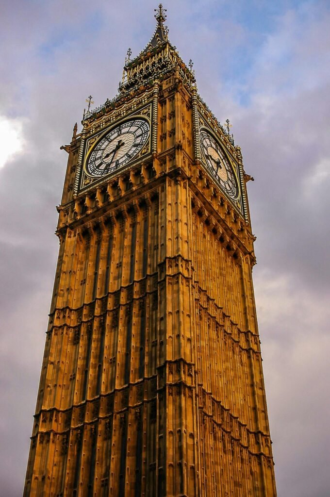 Close-up view of the iconic Elizabeth Tower, featuring the world-famous clock, in London, United Kingdom.
